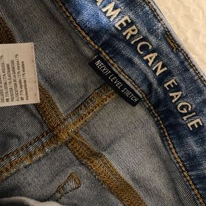 American Eagle Next Level Stretch Ripped Jeans
